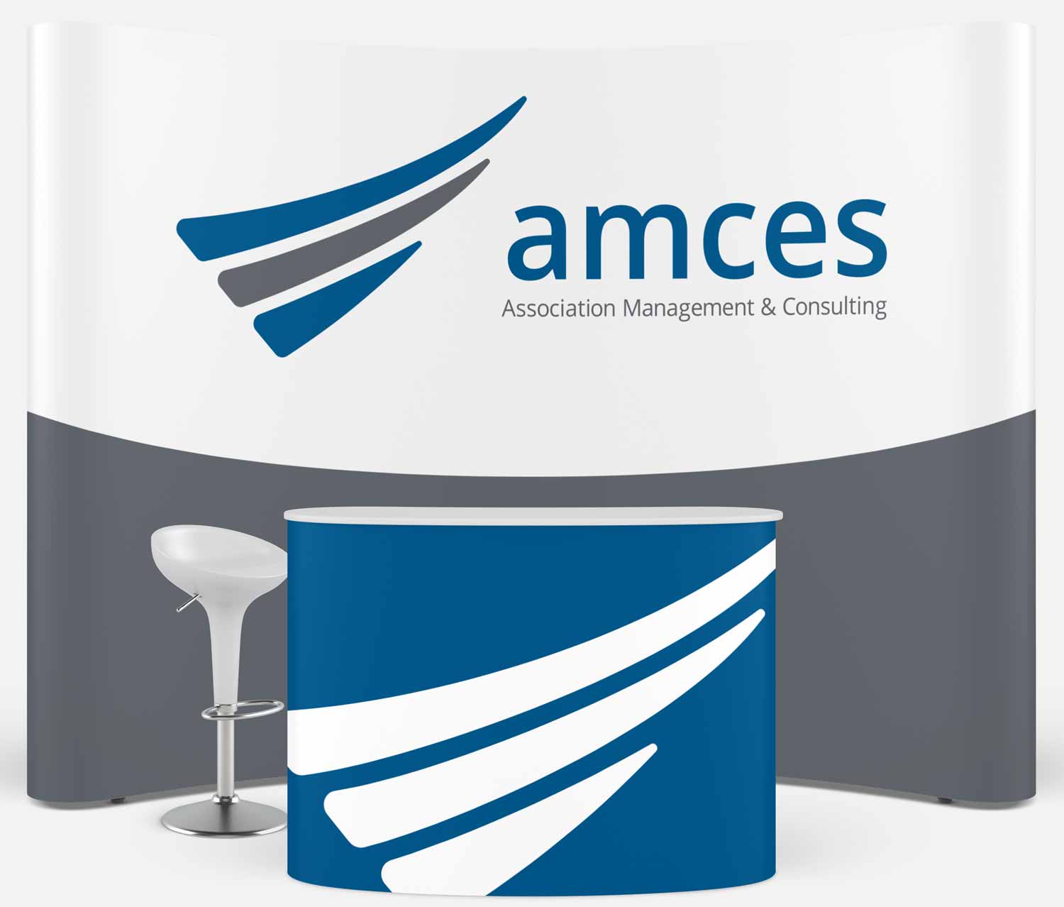 A conference booth with the AMCES branding.